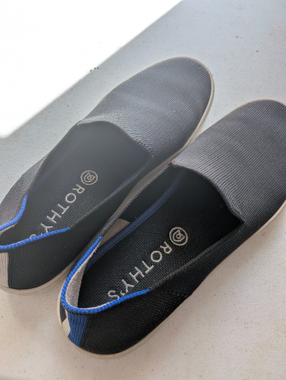 Rothy's Black Slip-On Loafers with White Soles